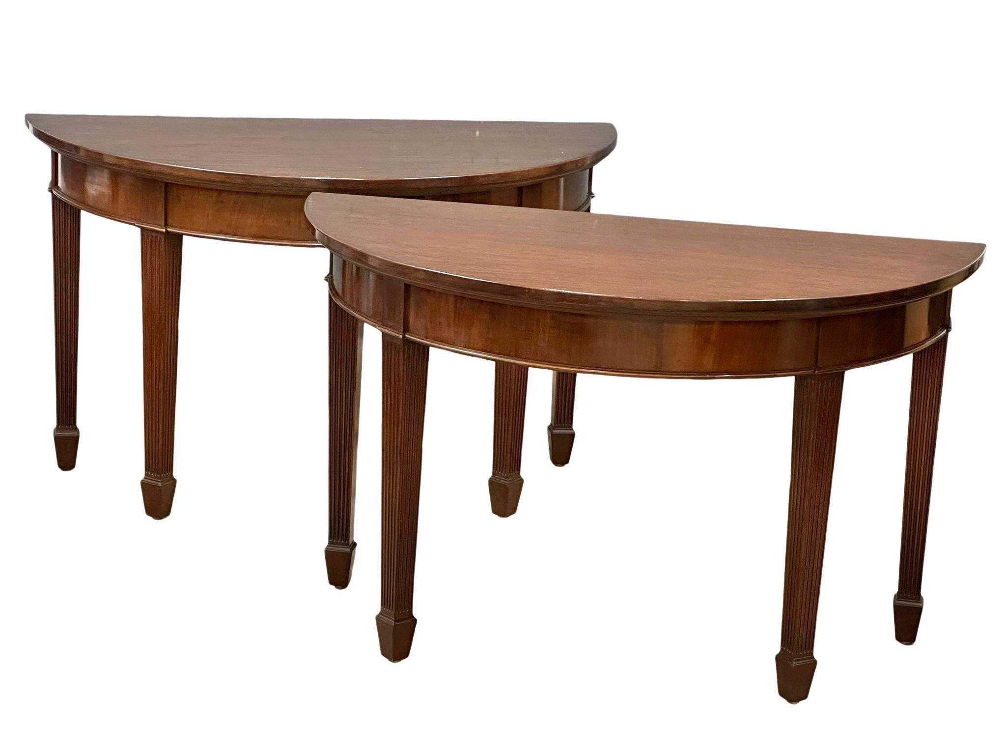 A pair of good quality Early 20th Century mahogany console tables in the Hepplewhite style. Circa