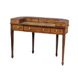 A Carlton House style inlaid mahogany writing desk with leather top in the manner of Sheraton