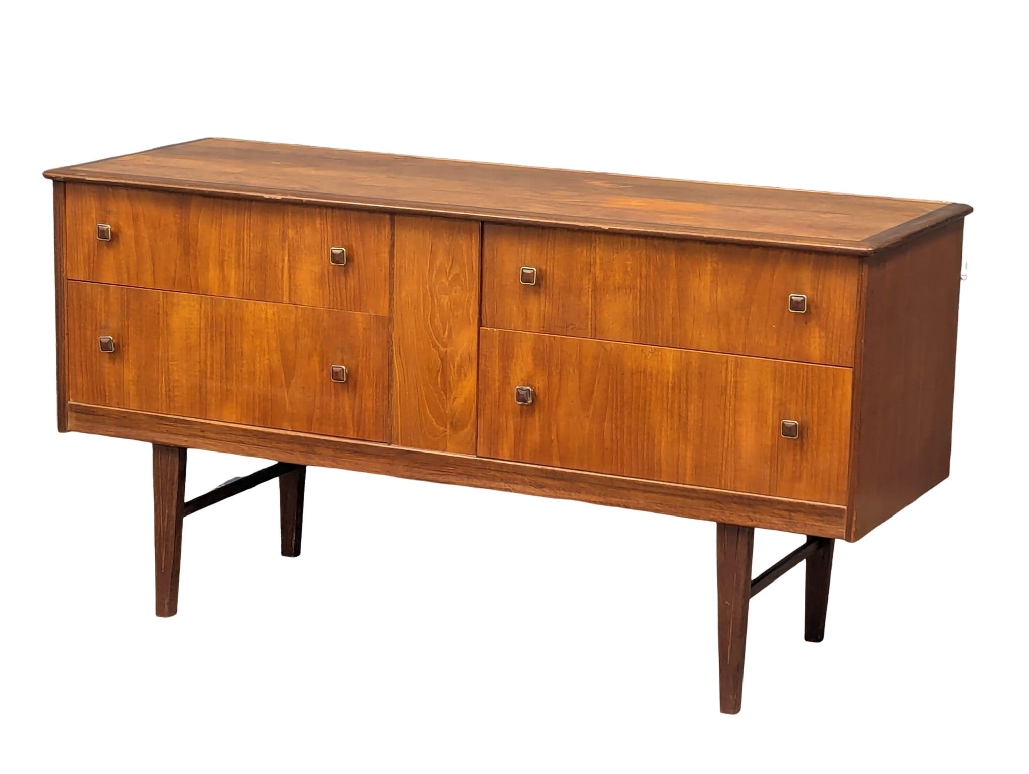 A Mid Century teak sideboard by Home Worthy. 137x47x73cm