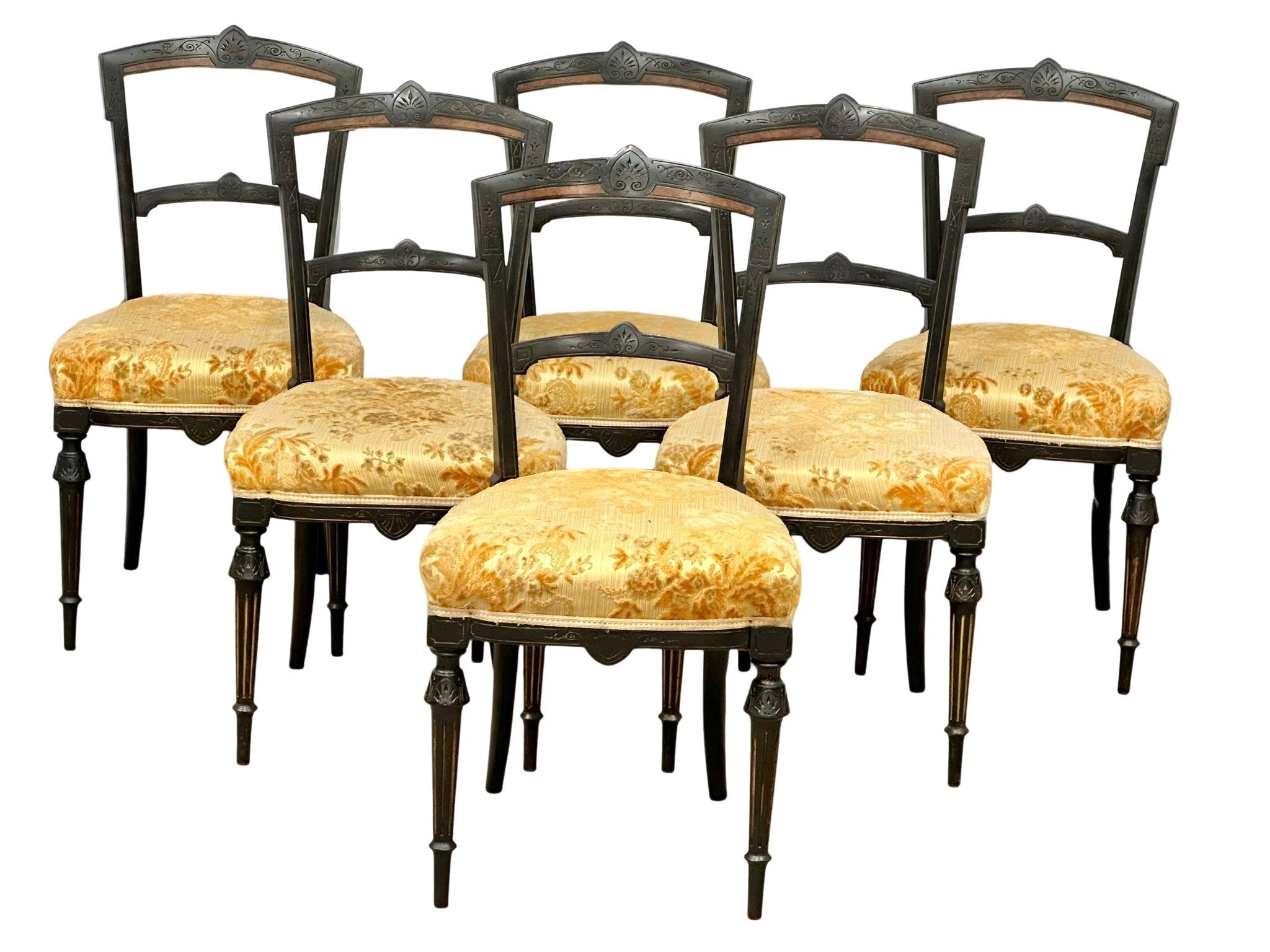 A set of 6 Victorian ebonised dining chairs. Circa 1890.