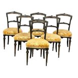 A set of 6 Victorian ebonised dining chairs. Circa 1890.