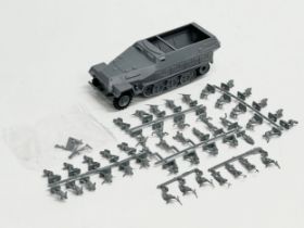 A collection of vintage Airfix WWII German soldiers. HO-OO scale. Including a WWII German Hanomag.