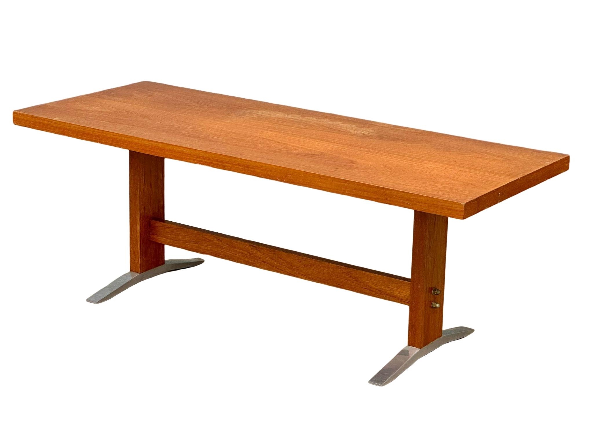 A Danish Mid Century teak coffee table on chromed feet. 120x48x44cm - Image 3 of 4