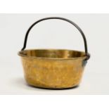 A Victorian brass jam pan. 33x32x29cm