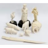 A collection of 19th and Early 20th Century bone figurines. 1 plastic.