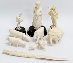 A collection of 19th and Early 20th Century bone figurines. 1 plastic.