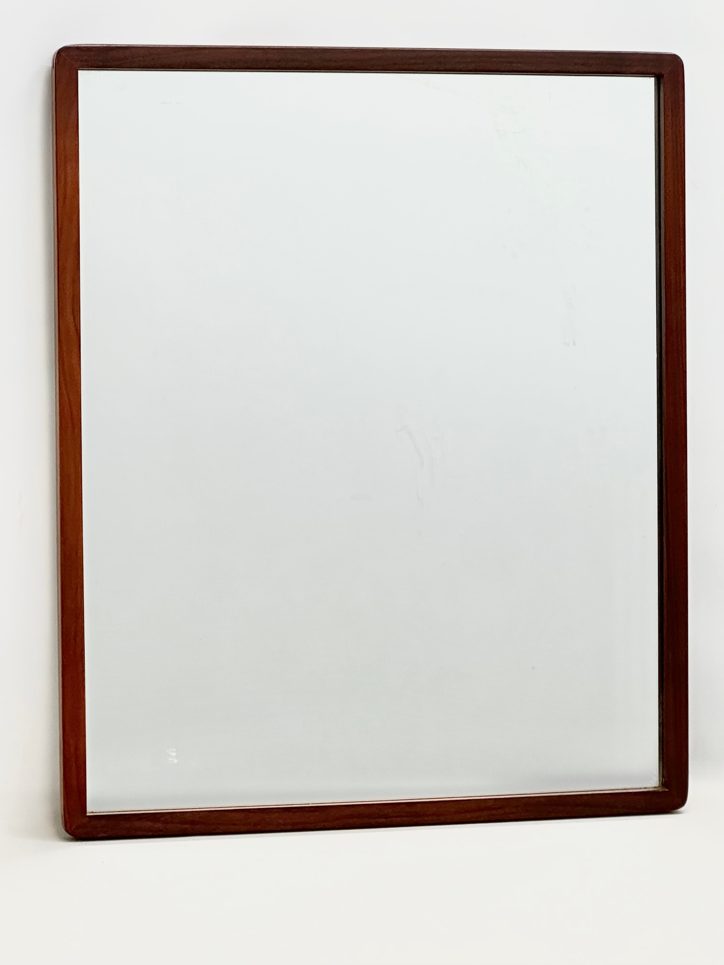 A G-Plan Mid Century teak mirror. 50.5x60.5cm