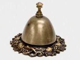 A Late 19th Century Victorian brass counter bell/shops bell. 10.5x8cm