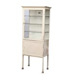 A 1950s medical cabinet with 3 glass shelves. 66.5x39x164cm