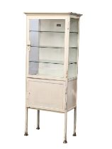 A 1950s medical cabinet with 3 glass shelves. 66.5x39x164cm