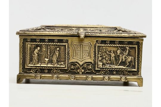 A Late 19th/Early 20th Century brass moulded cigar box, with medieval scenes. 17x17x8cm. - Image 4 of 10