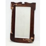 An Early 20th Century Arts & Crafts mirror. Circa 1900. 39x65cm