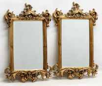 A pair of ornate 19th Century style gilt framed mirrors. 37.5x62cm.