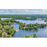 Experience the Best Resort Lifestyle: Great Homesite in Canadian Lakes, Michigan!