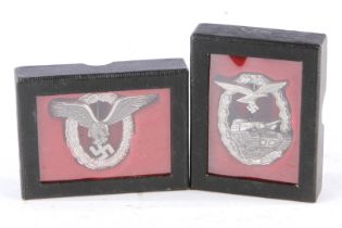 2 Anstecknadeln mit HK-Emblem, H 5 und 6, Z 3