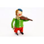 Schuco Tanzfigur Clown mit Geige, Uhrwerk intakt, leichte Alterungsspuren, H 11, Z 2