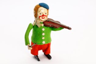 Schuco Tanzfigur Clown mit Geige, Uhrwerk intakt, leichte Alterungsspuren, H 11, Z 2