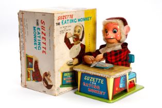 LINEMAR TOYS ”SUZETTE THE EATING MONKEY, with moving eyes and magnetic eating action”, Japan,