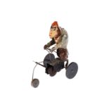 Uralt-Blechfigur Affe auf Dreirad, HL, Uhrwerk intakt, tw nachlackiert, L 13, Z 3