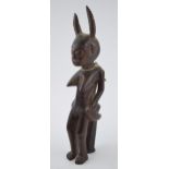 Tribal 19th century wood carving sculpture possibly of West African decent. Height 33cm. In original
