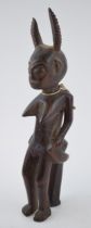 Tribal 19th century wood carving sculpture possibly of West African decent. Height 33cm. In original