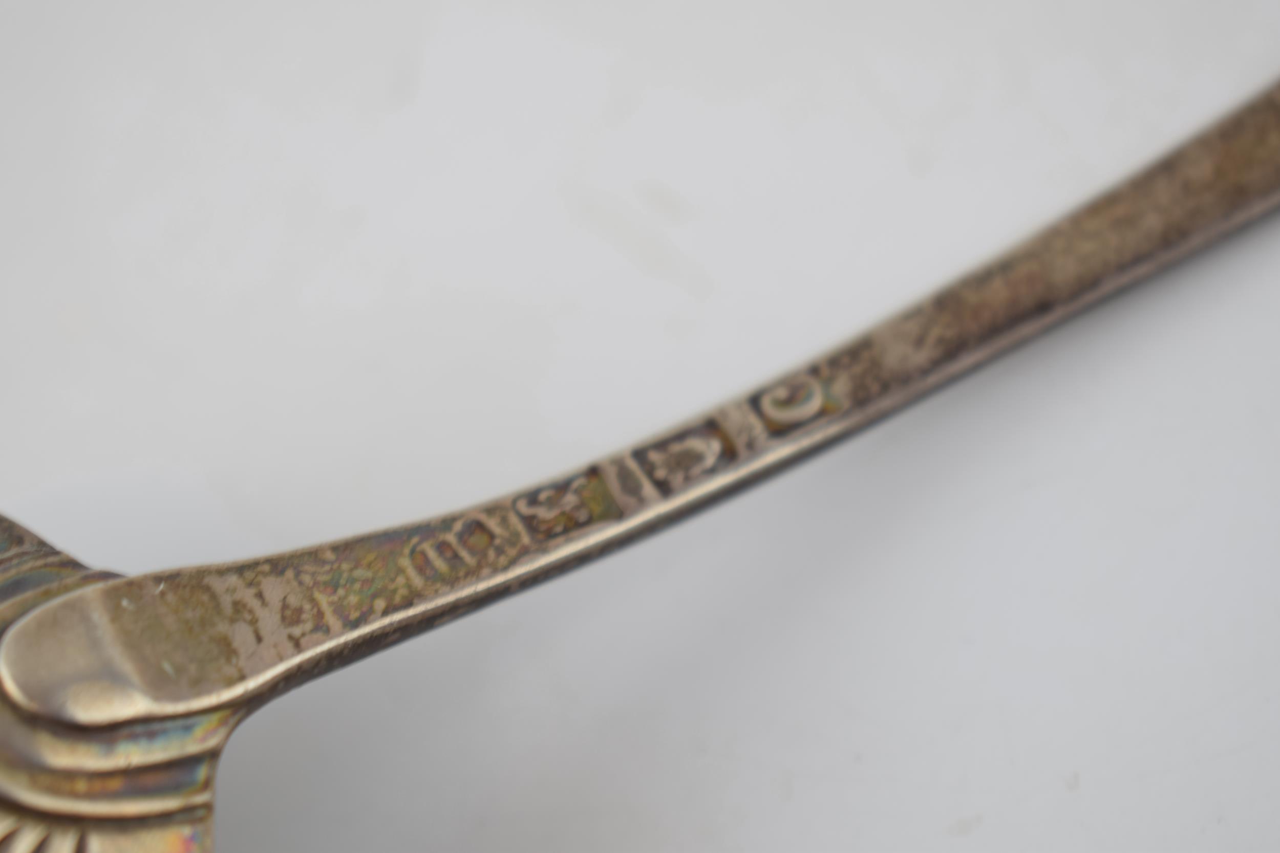 A Georgian silver shell shaped ladle hallmarked London 1818. Length 17cm. Weight 45.1 grams. In good - Image 3 of 3