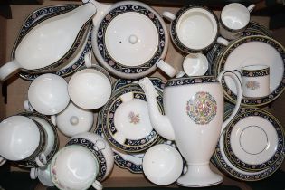 Wedgwood tea ware in the Runnymede pattern to include a teapot, a coffee pot, cups, saucers, side