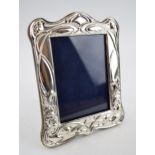 Hallmarked silver photo frame with easel back, 20cm tall, London 2021.