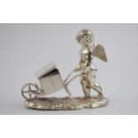 Elkington plate novelty table salt cherub. Elkington marks to inside of box on wheelbarrow. Height