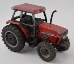 1/16th scale Eric 1989 tractor model of a Case Maxxum 5250, playworn condition.