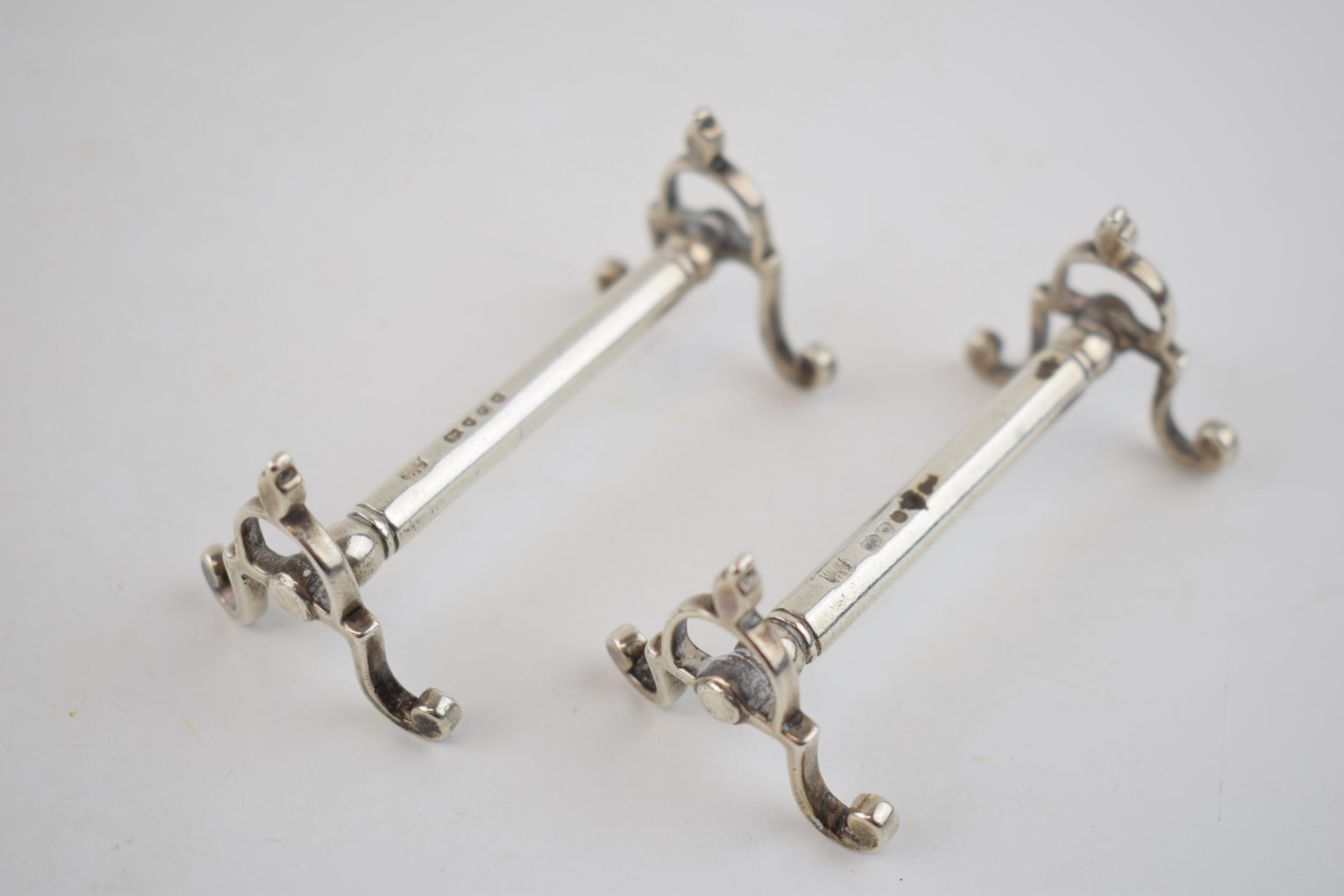 A pair of Victorian silver knife rests, hallmarked London 1849. 72.5 grams. Generally in good - Image 2 of 4