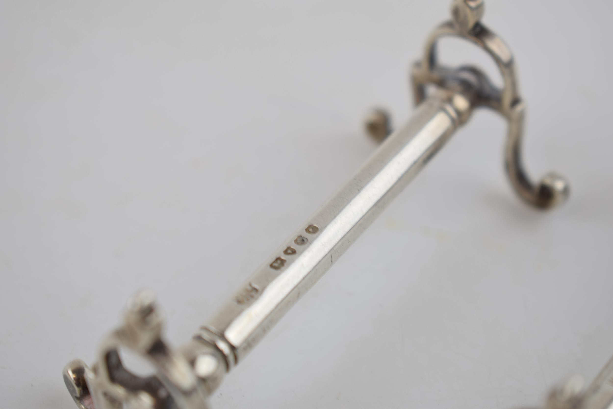 A pair of Victorian silver knife rests, hallmarked London 1849. 72.5 grams. Generally in good - Image 3 of 4