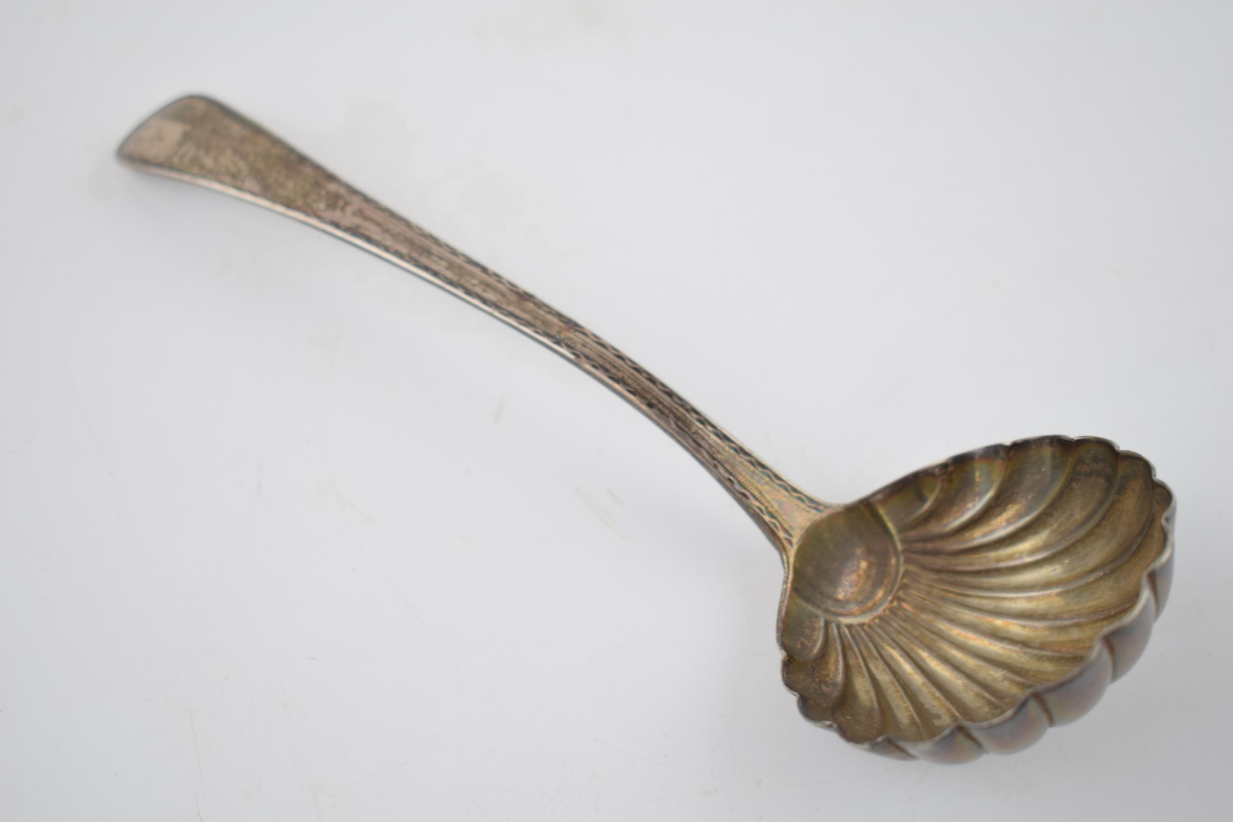 A Georgian silver shell shaped ladle hallmarked London 1818. Length 17cm. Weight 45.1 grams. In good