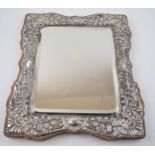 Hallmarked silver framed rectangular mirror, on wooden back, Birmingham 1905, 28.5cm tall. In good