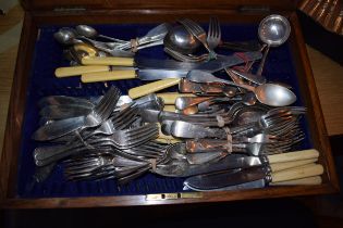 A good example of a cutlery canteen in golden oak with inlaid brass shield to lid complete with a