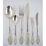 A good collection of silver 830 cutlery with an ornate filigree design, hallmarked 830 with