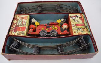 Boxed Wells O' London (Brimtoy) Mickey Mouse Handcar. Made in England. Set comprises of clockwork
