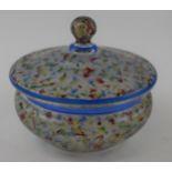 A 1930s glass bonbon dish with red, yellow, green and blue swirl decoration and blue rim. Diameter