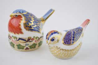 Royal Crown Derby paperweights to include a Robin Nesting and a Goldcrest, with gold stoppers (2).