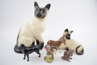 Beswick animals to include a black labrador, a donkey foal, a mouse, a goldfinch and 2 siamese