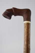 Traditional hand crafted walking stick, wooden handled, in the form of a hoof, ash (or similar)