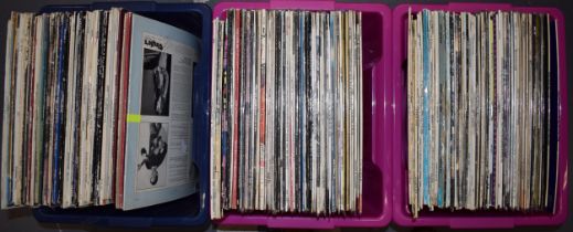 Three boxes of records to include artists such as The Temptations, Nat King Cole, Diana Ross and