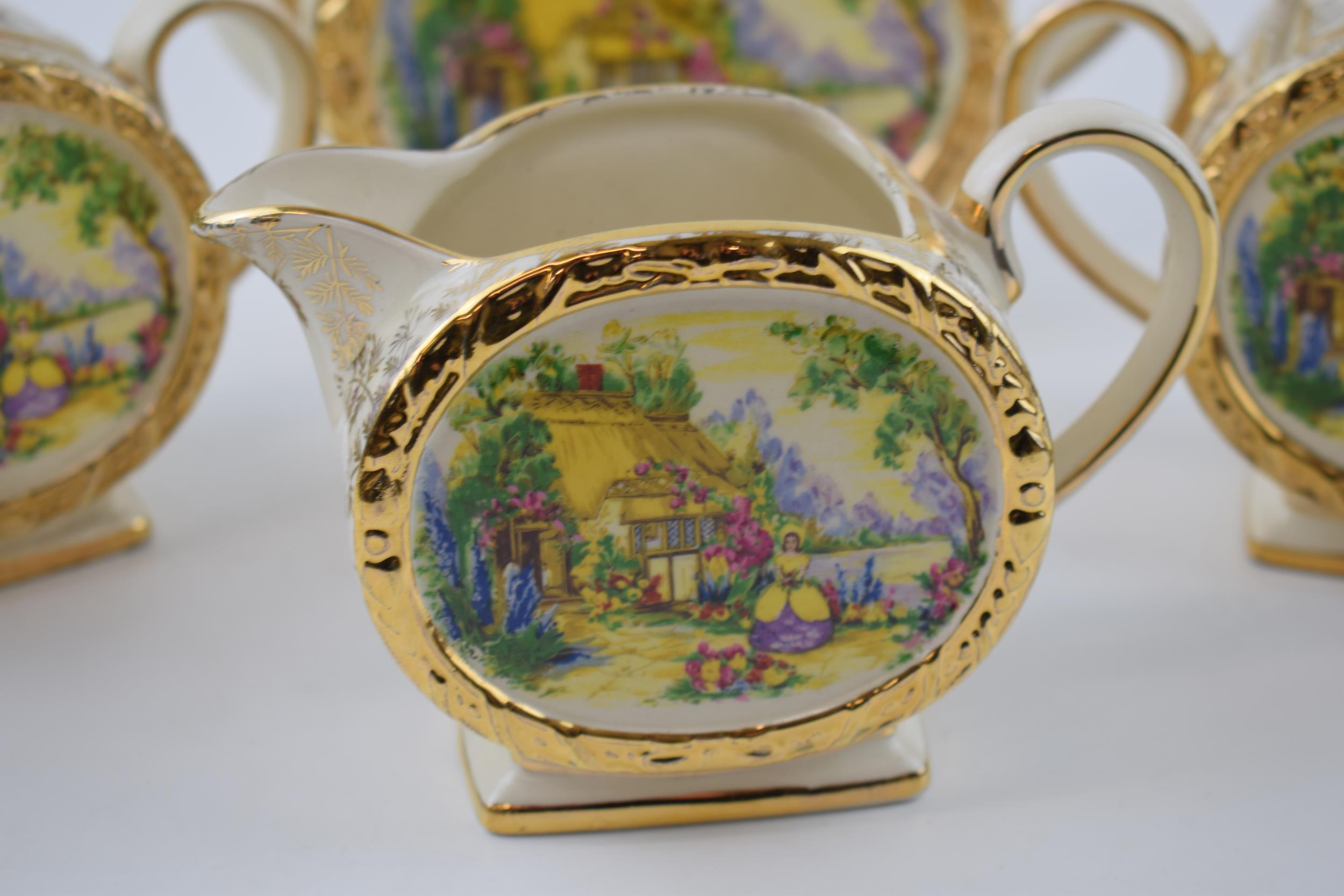 Sadler tea ware in a floral gilt pattern with a cottage scene to include a teapot, 2 lidded sugars - Image 2 of 4