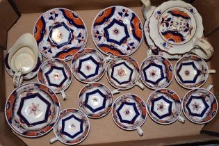 A porcelain part tea service, early 20th century, to include a teapot and cover, of lobed circular