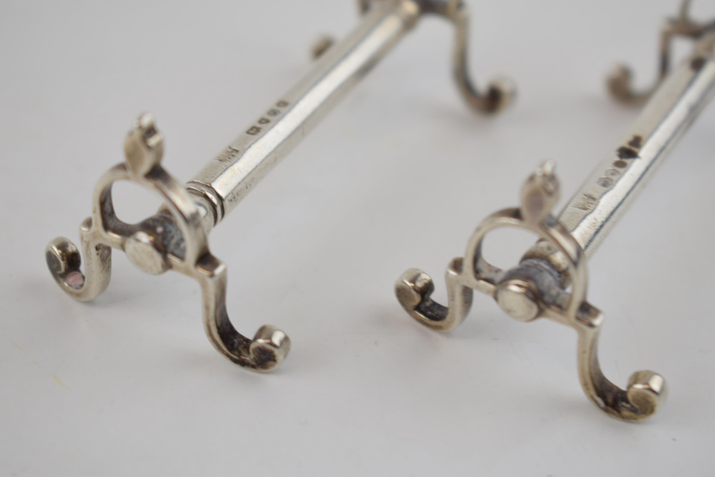 A pair of Victorian silver knife rests, hallmarked London 1849. 72.5 grams. Generally in good - Image 4 of 4