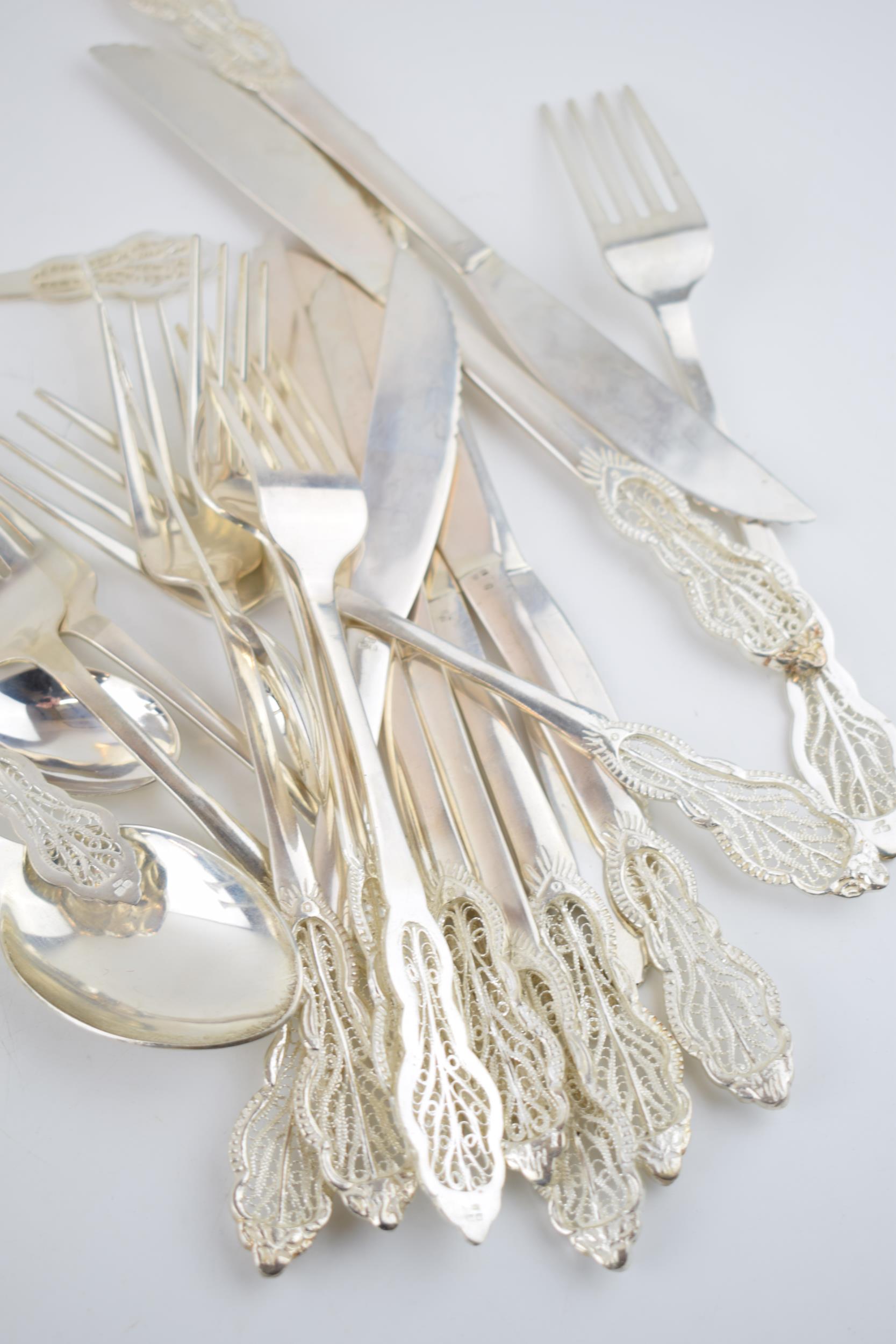 A good collection of silver 830 cutlery with an ornate filigree design, hallmarked 830 with - Image 3 of 8