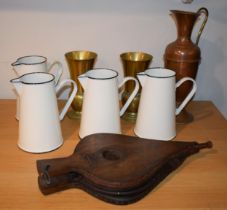 A collection of metalware to include 4 vintage style enamel jugs, brass vases, a copper jug and a