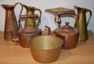 Antique metalware to include Victorian copper kettles, a brass jampan, a brass trivet and others (