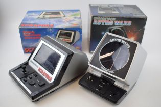 Vintage boxed electronic games to include 'Grandstand Astro Wars' together with Grandstand Scramble'