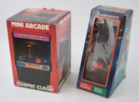 Vintage boxed electronic games to include 'Tomy Cosmic Clash - Mini Arcade' together with 'U.F.O.